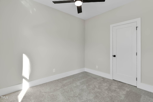 2401 E Main St, Durham, NC 27703 - carpeted empty room with ceiling fan and baseboards