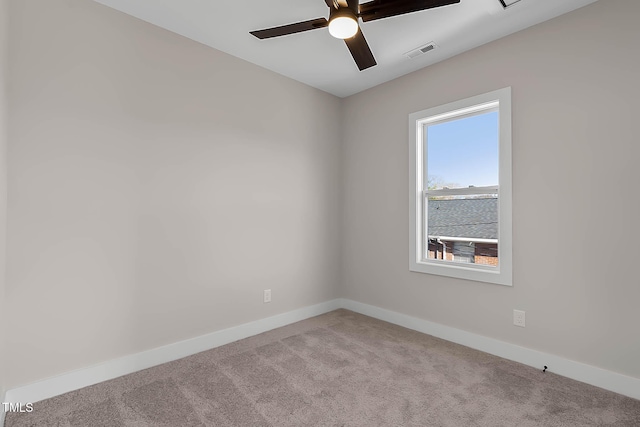 2401 E Main St, Durham, NC 27703 - carpeted spare room with ceiling fan and baseboards