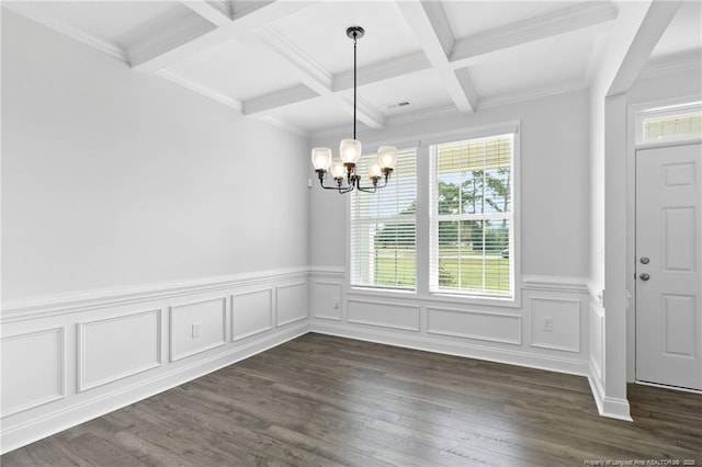 unfurnished dining area featuring dark hardwood / wood-style flooring, coffered ceiling, a chandelier, and beam ceiling