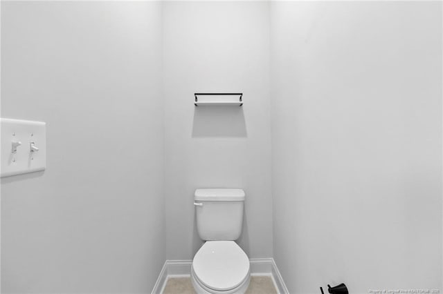 bathroom featuring toilet