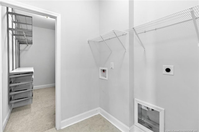 washroom featuring light colored carpet, hookup for a washing machine, and electric dryer hookup