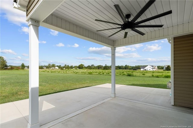 view of patio featuring ceiling fan