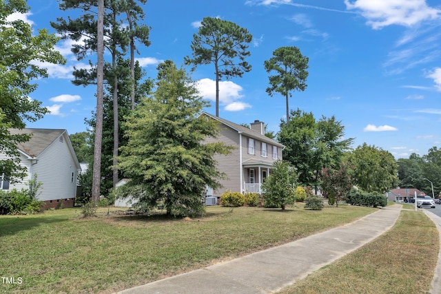 view of home's exterior featuring a lawn