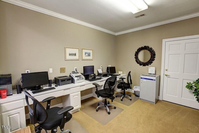 office space with light colored carpet, visible vents, and ornamental molding