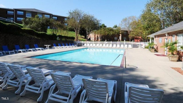 view of pool featuring a patio