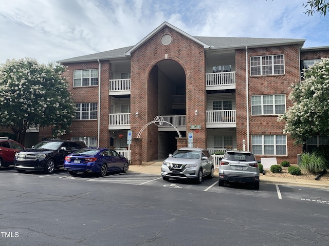 129 Sturbridge Dr Unit 15, Clayton, NC 27520 - view of building exterior with uncovered parking