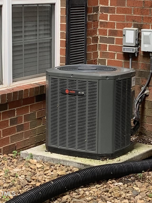 129 Sturbridge Dr Unit 15, Clayton, NC 27520 - exterior view of central air condition unit and brick siding