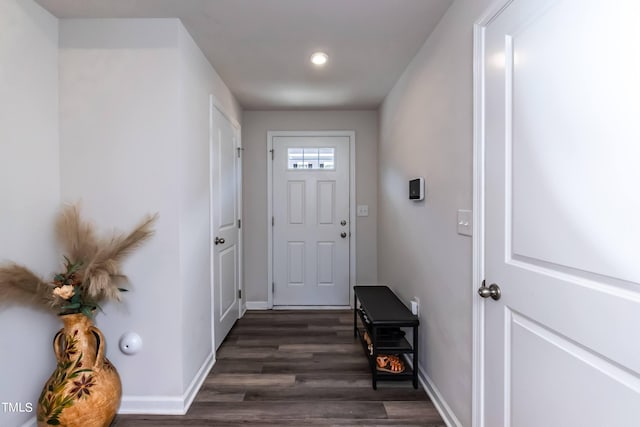 doorway to outside with dark hardwood / wood-style flooring