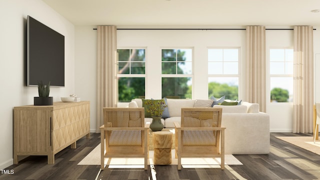 sitting room featuring baseboards and dark wood-style floors