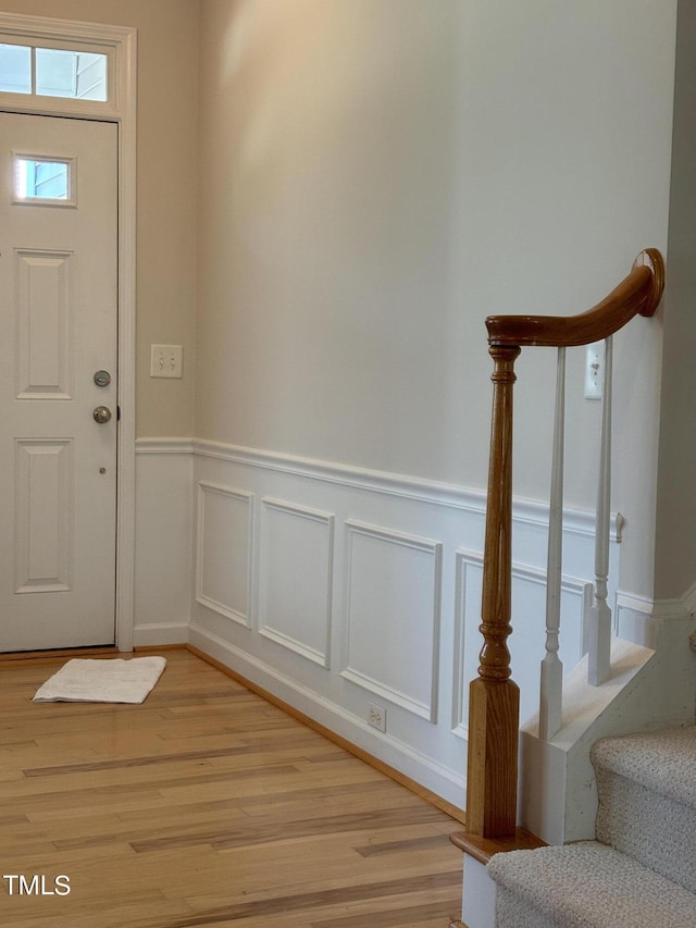 foyer with light hardwood / wood-style flooring