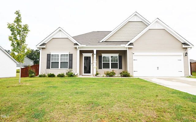 craftsman-style house with a front lawn and a garage