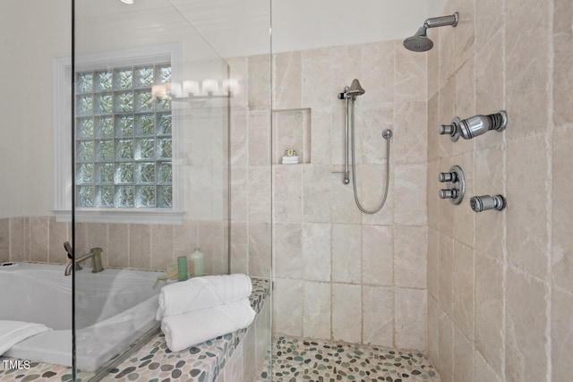 bathroom with independent shower and bath