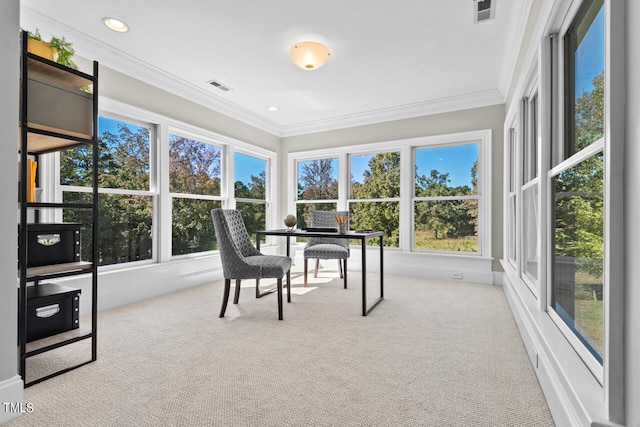 office area featuring light carpet, ornamental molding, and plenty of natural light