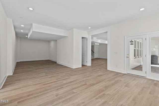 unfurnished room featuring light hardwood / wood-style floors