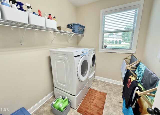 laundry area with washer and dryer