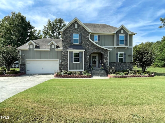 craftsman house with a front yard and a garage