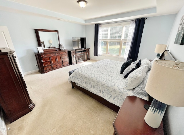 bedroom with light colored carpet