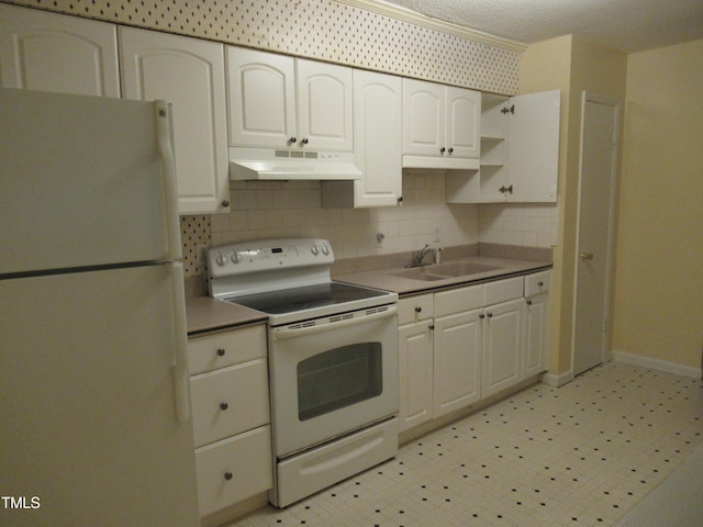 kitchen with decorative backsplash, white cabinets, white appliances, and sink