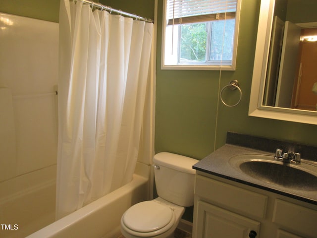 full bathroom with shower / bath combo, vanity, and toilet