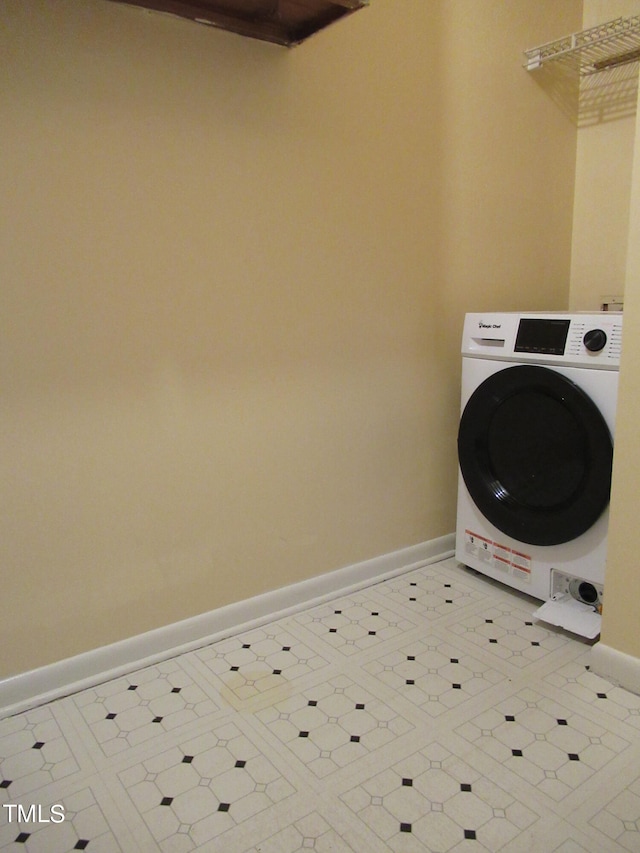 laundry area with washer / dryer