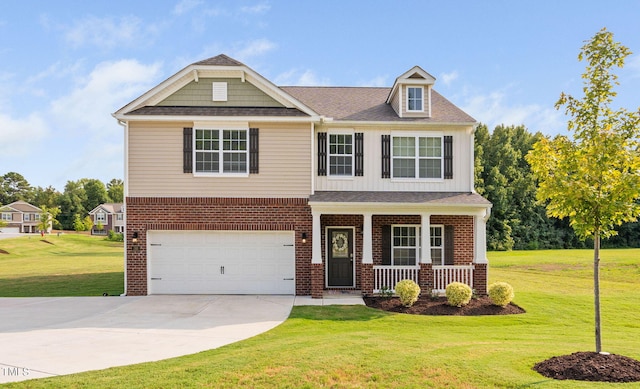 craftsman-style home featuring a porch, a front yard, and a garage