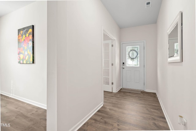 foyer entrance featuring hardwood / wood-style floors