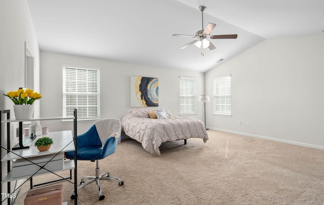 bedroom with lofted ceiling, ceiling fan, and carpet flooring