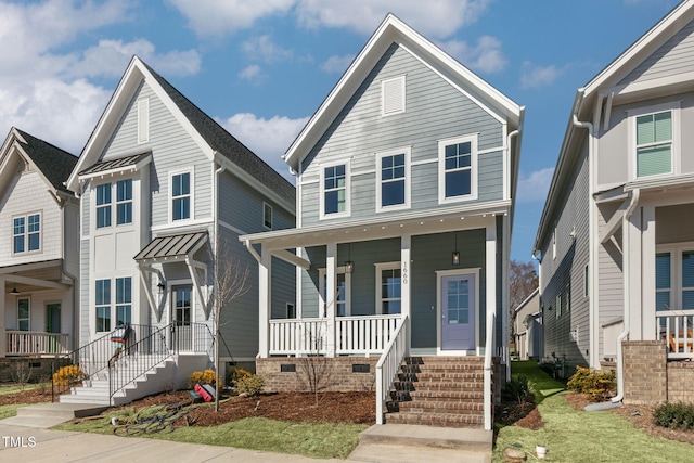 view of front facade featuring covered porch