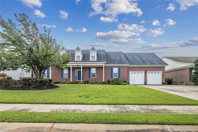 view of front facade with a garage and a front lawn