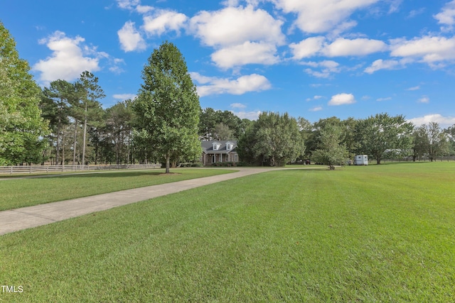 view of community featuring a yard