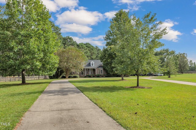 view of front of home with a front lawn