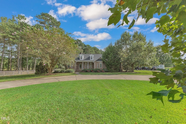 view of front of home with a front yard