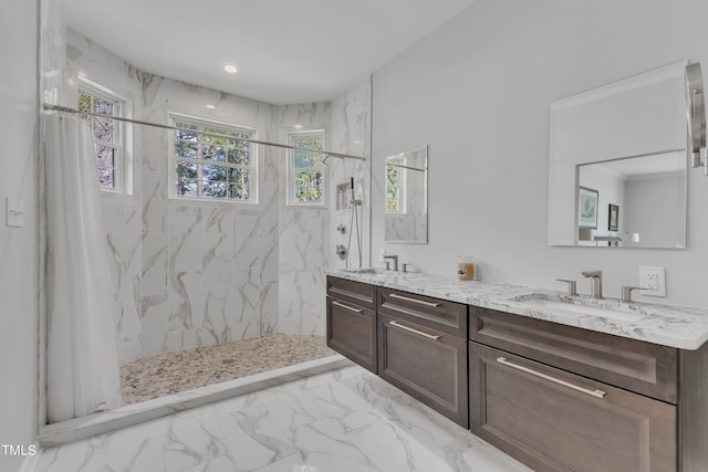 bathroom featuring vanity and walk in shower