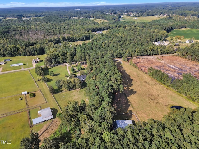 birds eye view of property featuring a rural view