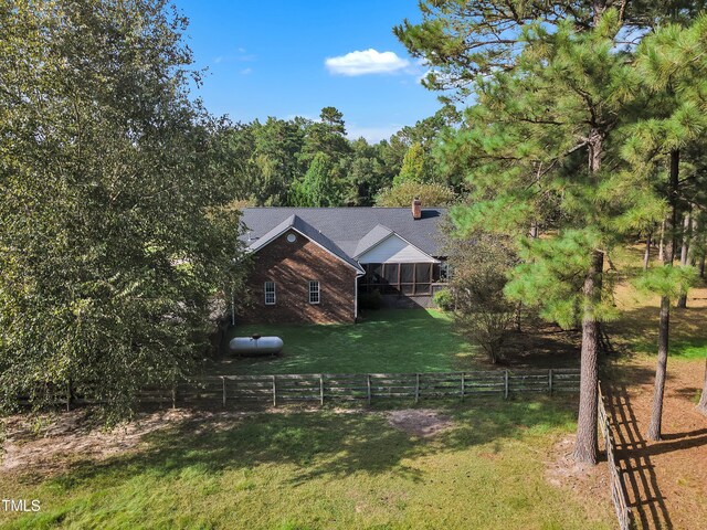 view of property exterior with a yard