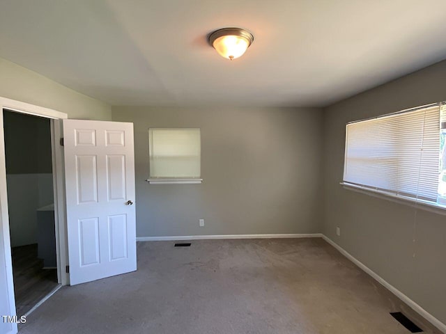 unfurnished bedroom featuring carpet floors