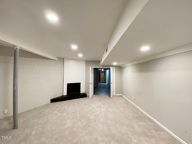 basement with carpet flooring