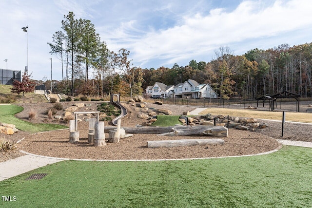 view of community with a lawn