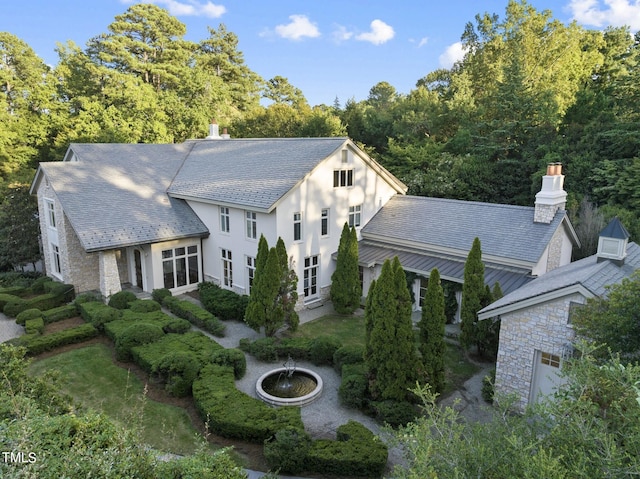 view of front of home with an outdoor fire pit