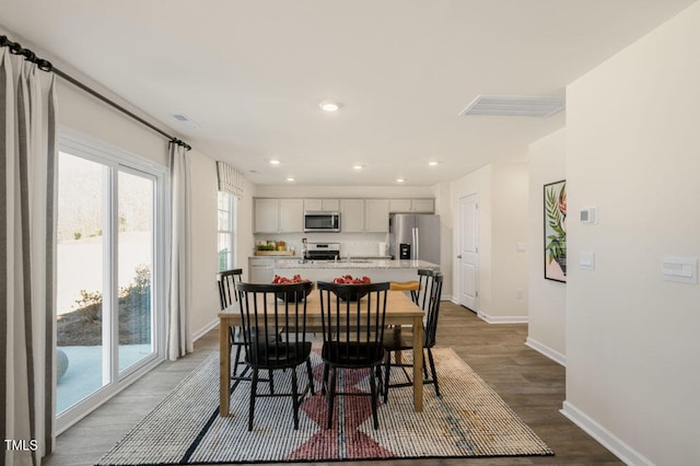 dining room featuring light hardwood / wood-style floors