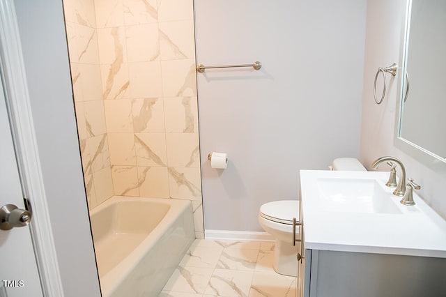 full bathroom with vanity, toilet, and tiled shower / bath