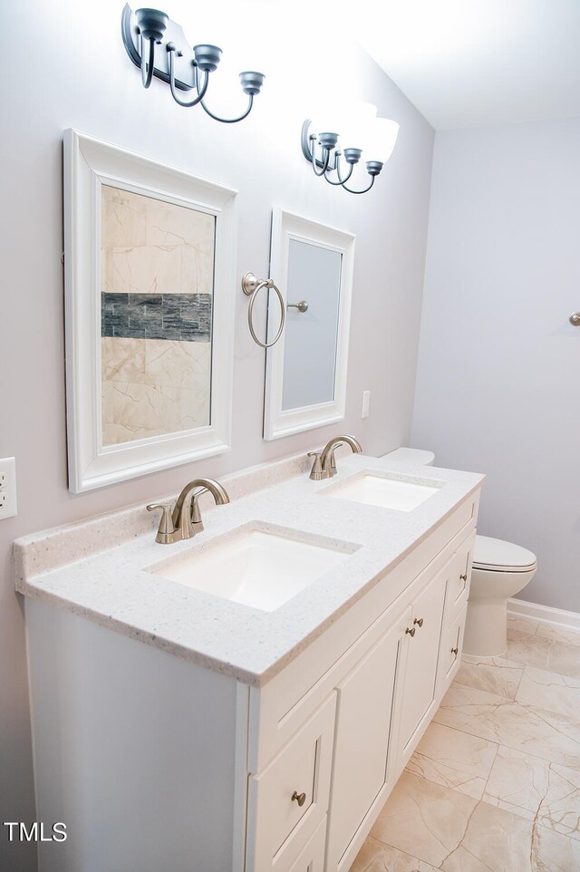 bathroom with a shower, vaulted ceiling, toilet, and vanity