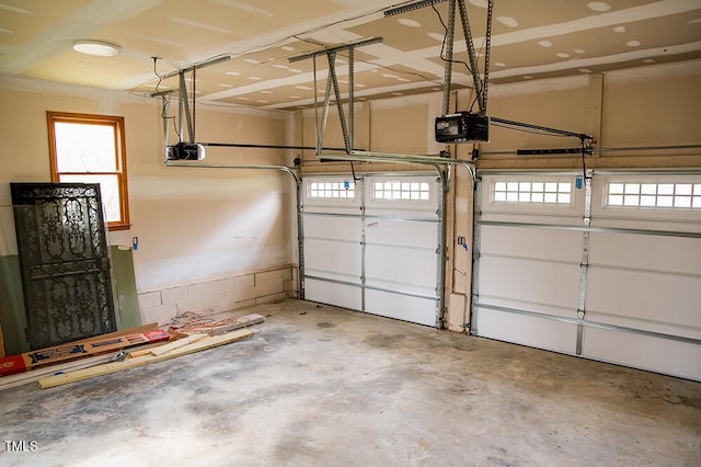 garage featuring a garage door opener