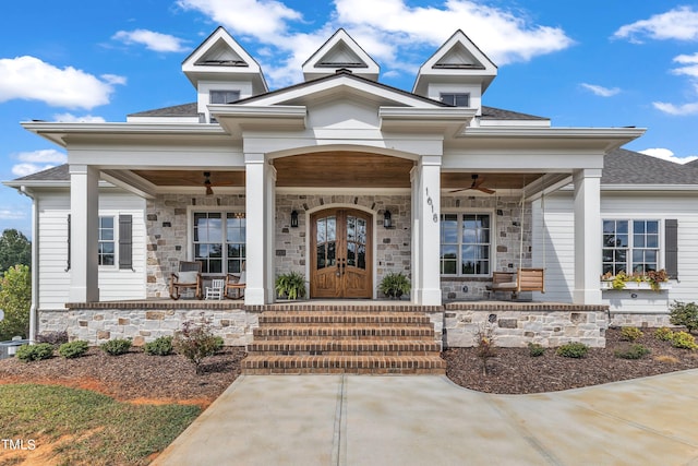 view of front of property with ceiling fan and a porch