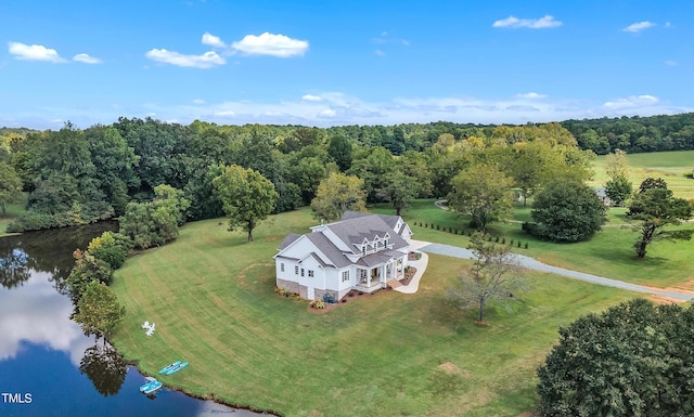 birds eye view of property with a water view and a rural view