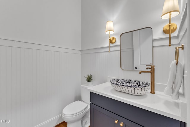 bathroom with vanity and toilet