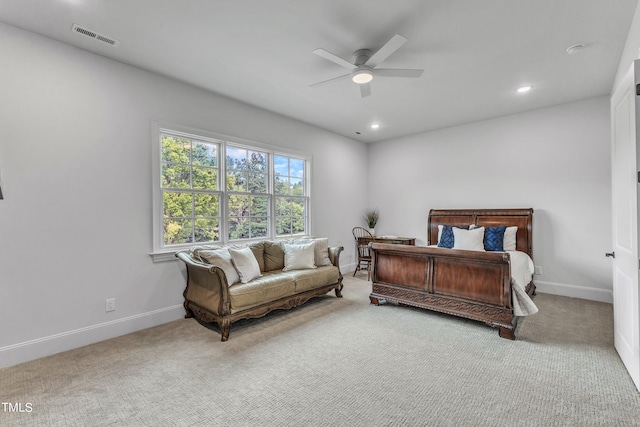 bedroom with ceiling fan and carpet