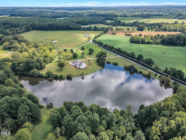 drone / aerial view with a water view and a rural view