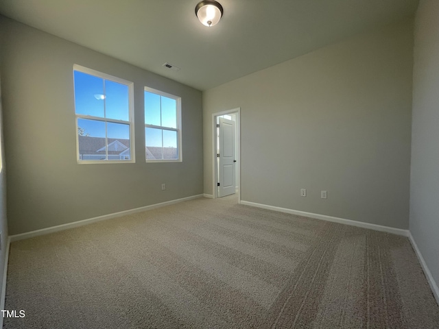 view of carpeted spare room