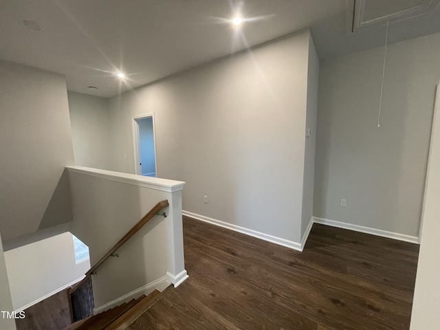 hallway with dark wood-type flooring